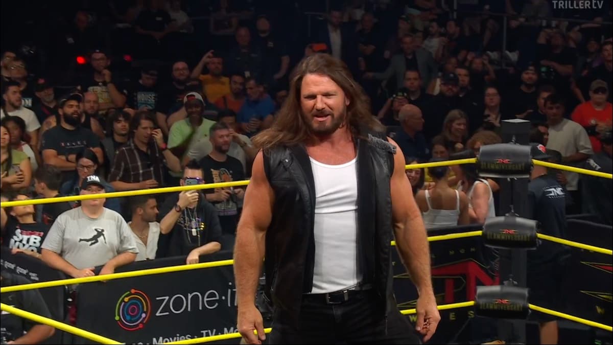 AJ Styles standing on the middle rope at TNA Slammivwersary 2025