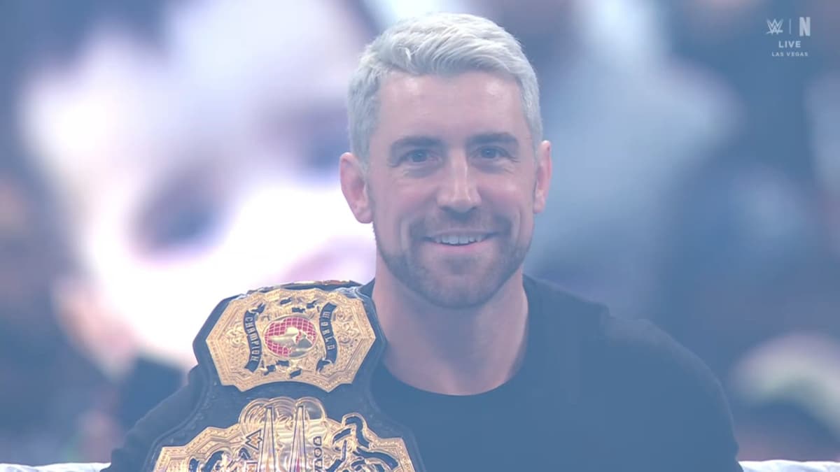 Joe Hendry at WWE WrestleMania 41 smiling and wearing a black t-shirt