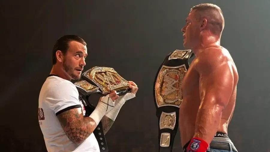 CM Punk John Cena WWE Titles.jpg