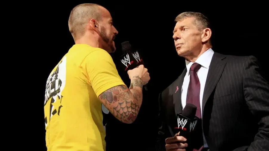 CM Punk Vince McMahon 2012.jpg