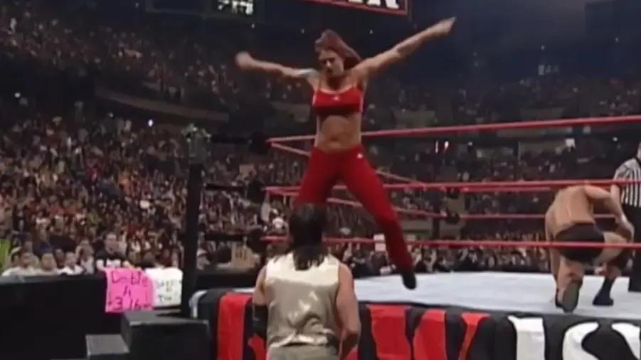 Lita Eddie Guerrero Raw is War.png