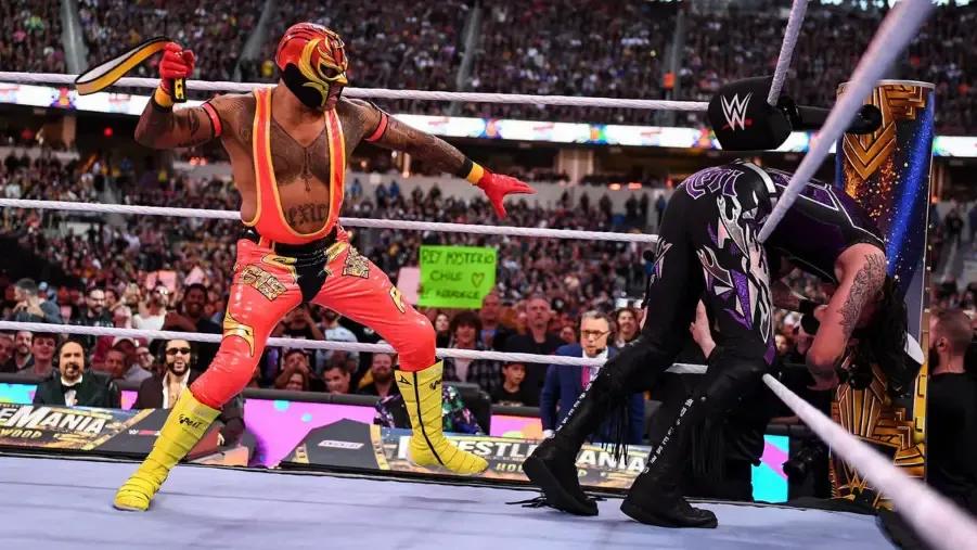 Rey Mysterio WrestleMania 39 whipping Dominik Mysterio in the ass.jpg