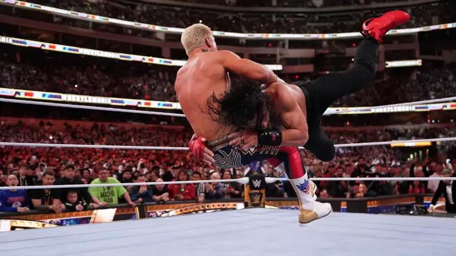 Roman Reigns spearing Cody Rhodes WrestleMania 39.jpg