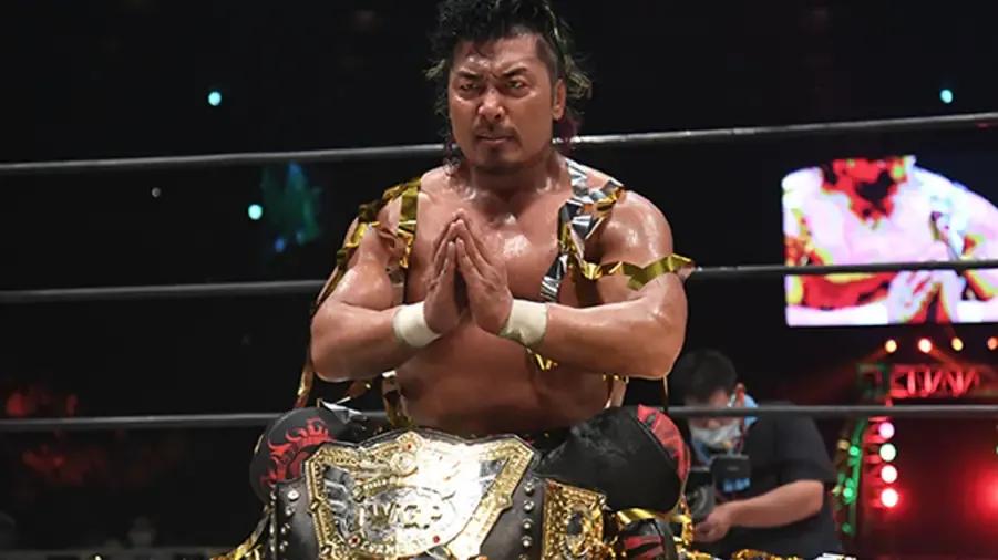 Shingo sitting with title.jpg