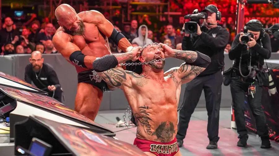 Triple H Batista WrestleMania 35 chain face.jpeg