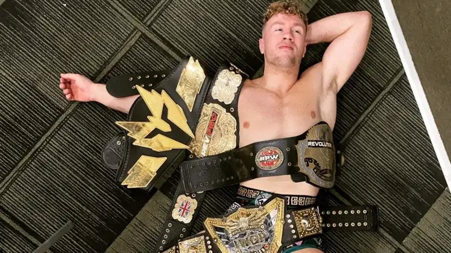 Will Ospreay lots of gold.jpg