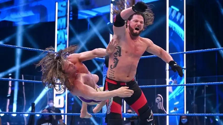 aj styles matt riddle punch.jpg