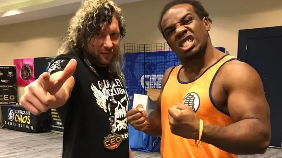 kenny omega-xavier woods.png