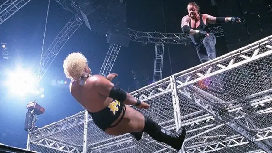 3bcec22784eadc0dfe42c63df0b84f322f02f538-rikishi-the-undertaker-armageddon-2000-hell-in-a-cell.jpg