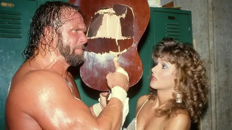 https://cultaholic.com/files/images/18c03427c726bdb67c5fe820029356b48a615a42-macho-man-randy-savage-miss-elizabeth.jpg