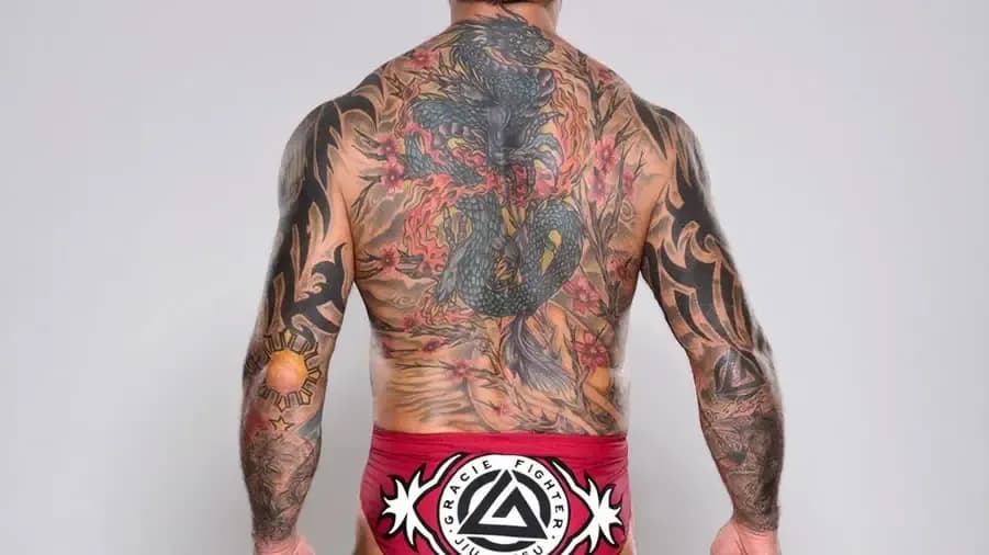 https://cultaholic.com/files/images/1fb6550cf68fa9bfb3682dd4f0d50b91a84c3ad9-batista-back-tattoo.jpg