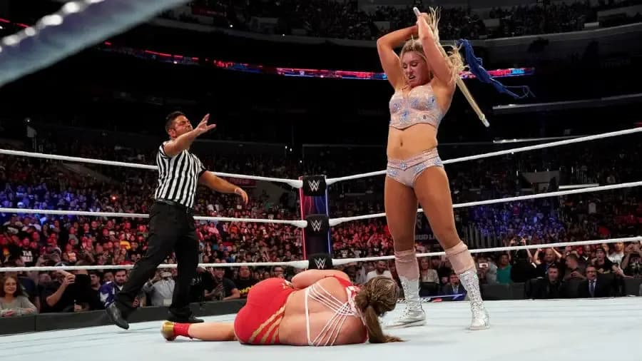 https://cultaholic.com/files/images/49a16e551eaea9205c9fd4c25b2d7c5e8e87879c-Ronda-Rousey-Charlotte-Flair.jpg