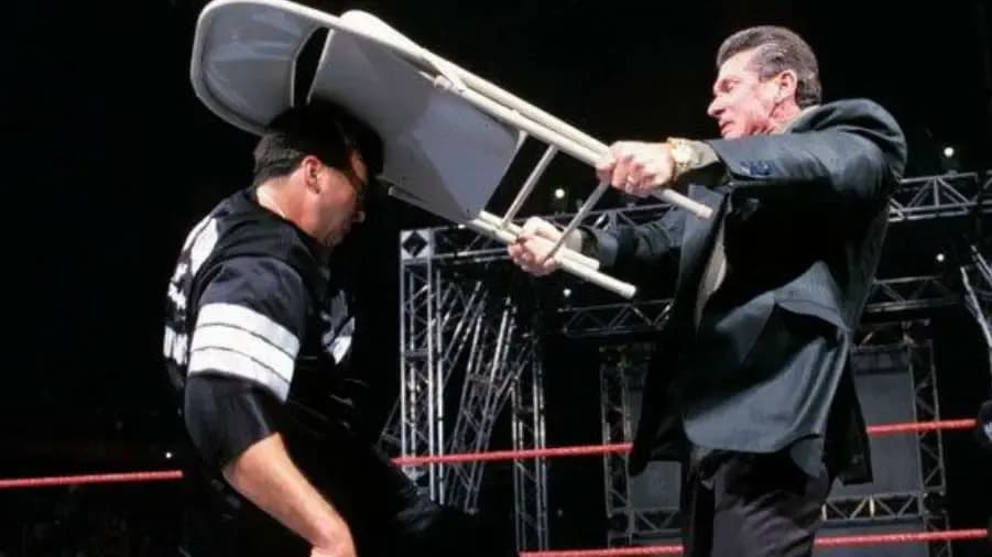 https://cultaholic.com/files/images/5247a8c16716dc669af079e0335e6b11f3bb8d58-shane-mcmahon-vince-mcmahon-backlash-2001.jpg