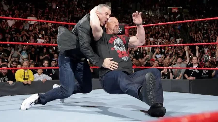 https://cultaholic.com/files/images/6be6db49a6c97edd558d268cbea185bfdb2b0cb7-shane-mcmahon-stone-cold-steve-austin.jpg
