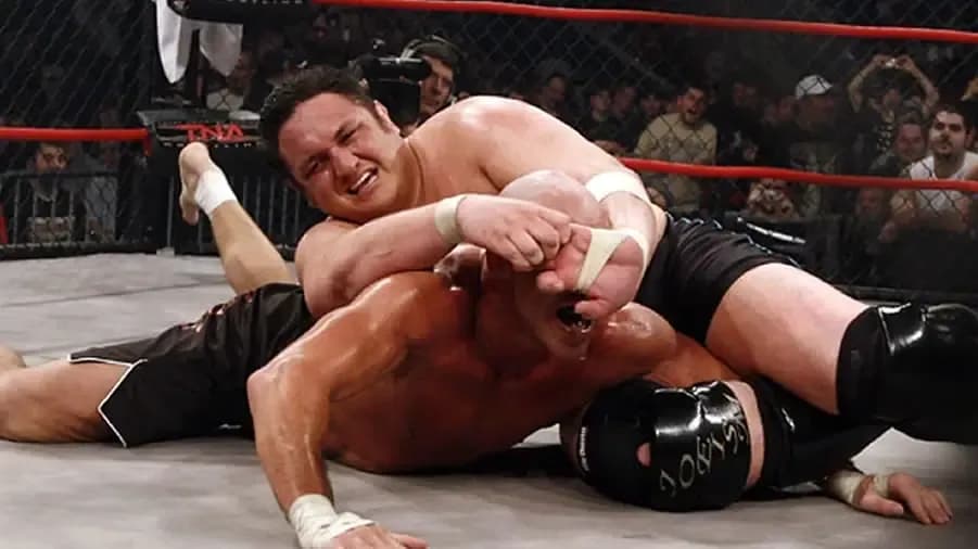 https://cultaholic.com/files/images/7a9144d8f1bf256199fd323d9c5562c056d51682-samoa-joe-kurt-angle-lockdown-2009.jpg