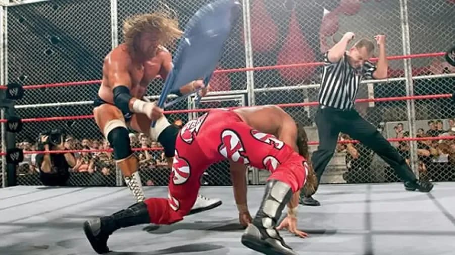 https://cultaholic.com/files/images/a1e260ec87515288c2b055343cc7d28f15a20a29-triple-h-shawn-michaels-badd-blood-2004.jpg