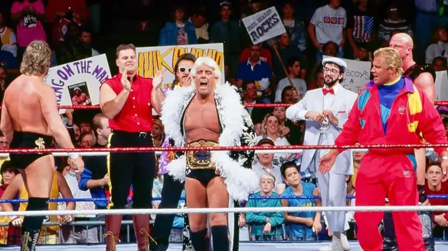 https://cultaholic.com/files/images/b28b19e29b5ab2af01be8fb79cef50a16486abc6-ric-flair-fake-world-title-survivor-series-1991.jpg