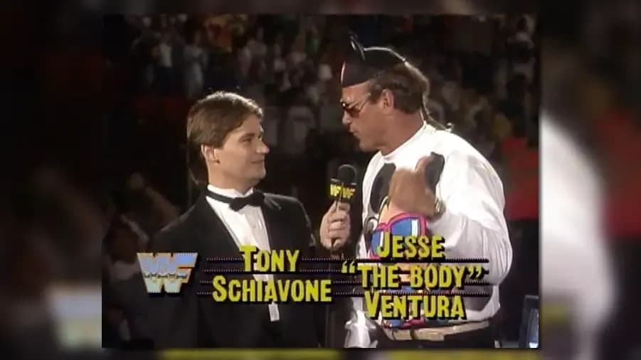 https://cultaholic.com/files/images/b4acaa40eb3dbed4e6ce9002437d130a2cc7004a-tony-schiavone-jesse-ventura-royal-rumble-1990.jpg