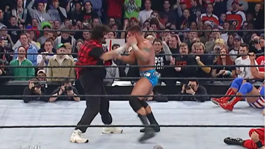 https://cultaholic.com/files/images/e86bf1adf9a71d4c309ef2eded0bd91d039a5a0a-foley-randy-orton-royal-rumble-2004.jpg